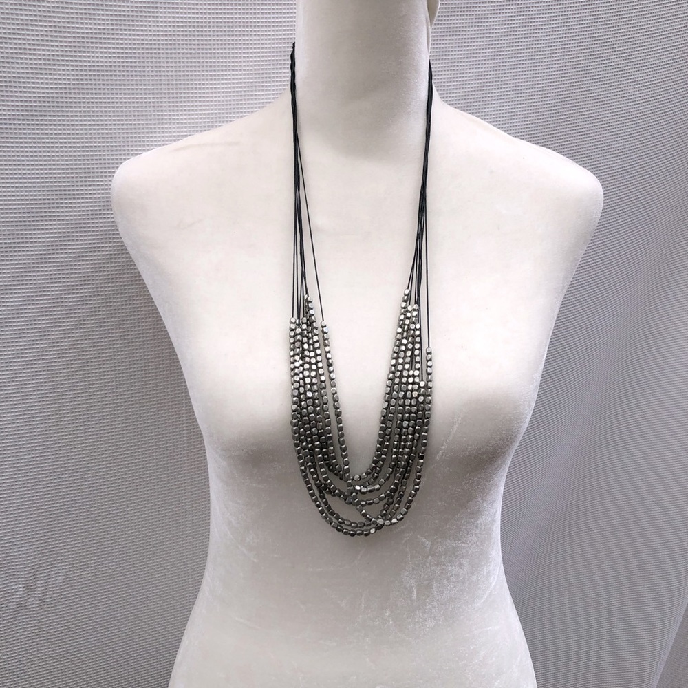 Silver tone beaded multi strand leather necklace